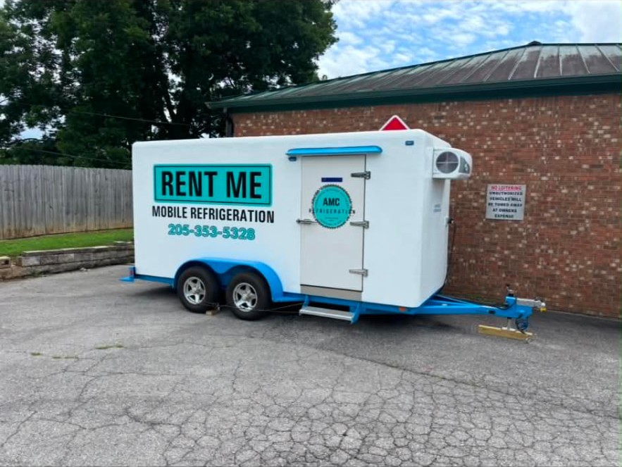 Side profile of the AMC Rent Me mobile refrigeration trailer