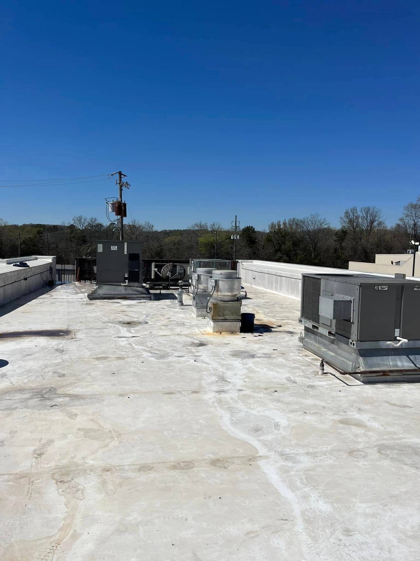 Rooftop HVAC units under blue sky